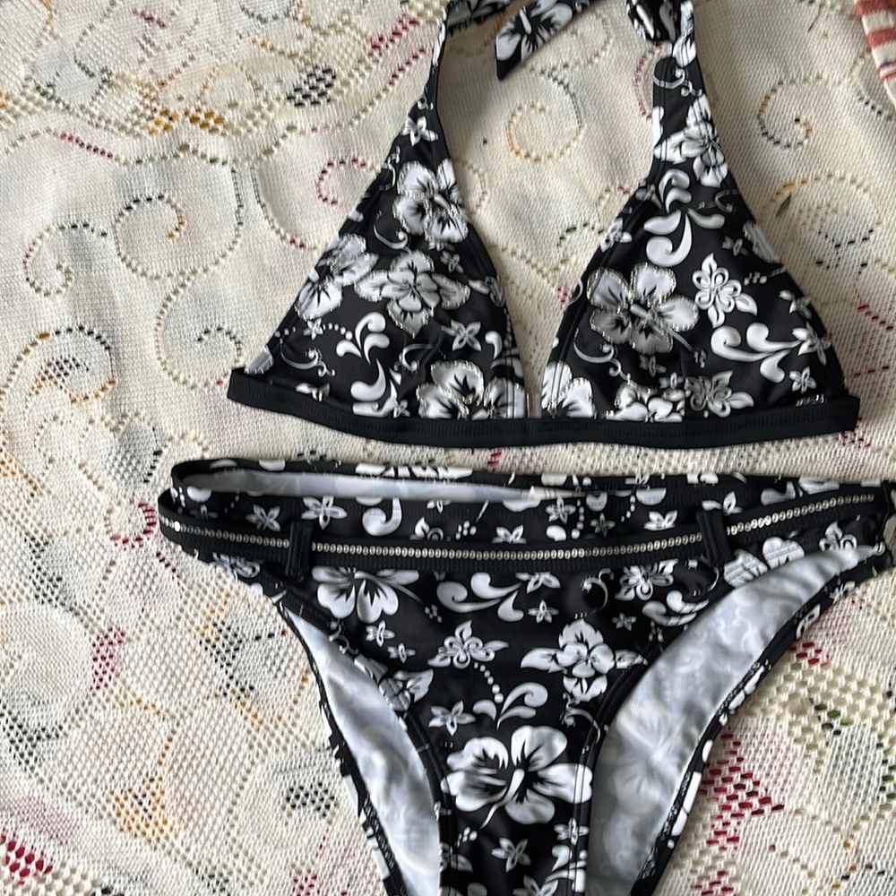 Cute bathing suit, new, with What is silvery embroidery detail